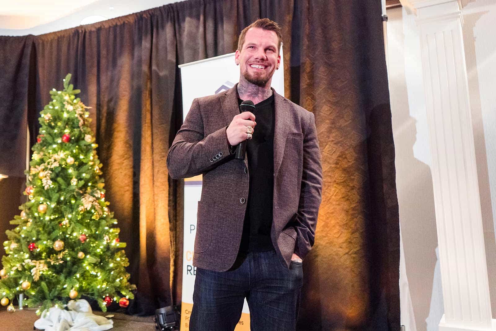 Cody Bates laughing during his presentation.